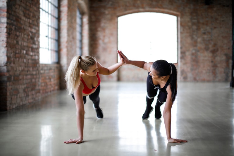 fitness clients give high five